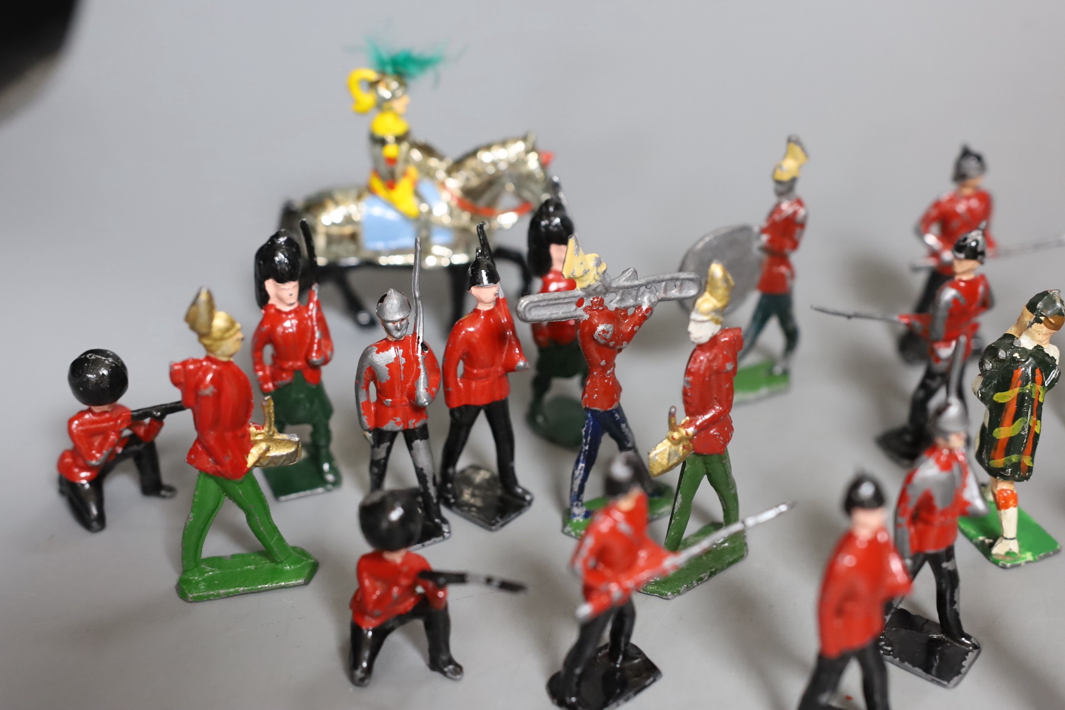 A quantity of cold painted lead soldiers and band.